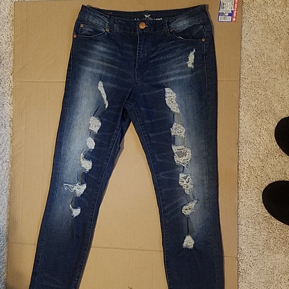 Almost Famous junior distressed mid rise jeans